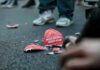 Shattered Make America Great Again hat on the ground