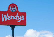 New Frosty Mania Hits Wendy’s Wendy's restaurant sign against a clear blue sky