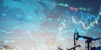 Oil pumps and financial charts against world map