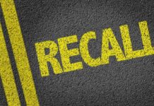 New Recall Alert Shocks 1 Million Vehicle Owners Yellow 'RECALL' text on a dark asphalt surface