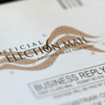 Official election mail envelope with postal service markings