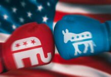 Red and blue boxing gloves with political party symbols.