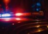 Florida Gun Horror: Toddler Dead Close-up of a police car's emergency lights at night