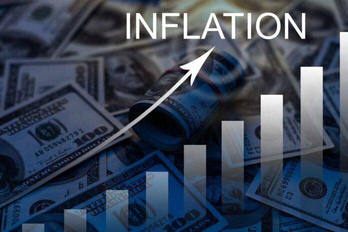 Word,Inflation,Against,Background,Of,Graph,Chart,Of,Rising,Inflation A visual representation of inflation with dollar bills and a rising graph