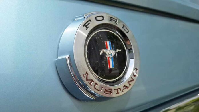 Surabaya,,Indonesia,-,January,12,,2025:,Close-up,Of,Emblem,On Ford Mustang emblem on a light blue car