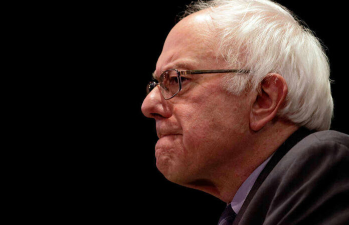 shutterstock_388723837 Bernie Sanders in glasses.