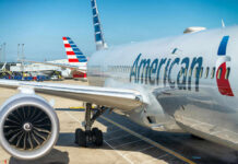 AiAmerican Airlines plane on airport tarmac