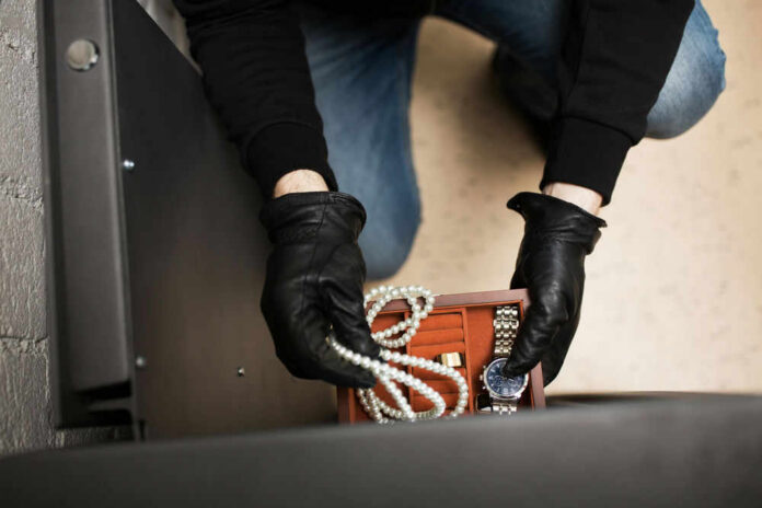 Theft wearing gloves with stolen jewelry