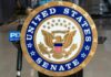 Family Bombshell Rocks Congress Seal of the United States Senate displayed prominently