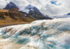 Snowy mountain landscape with glacial ice and rocks