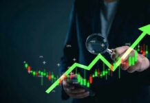 Oil Slips, Wall Street Explodes Business professional analyzing stock market trends with a magnifying glass