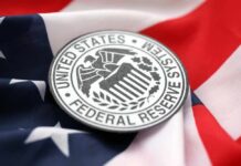 Federal Reserve System emblem on an American flag