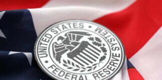 Federal Reserve System emblem on an American flag