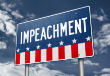 Impeachment Drumbeat Builds – Stakes Go Nuclear A sign displaying the word 'IMPEACHMENT' against a cloudy sky