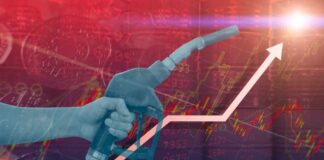 Hand holding a fuel nozzle with rising graph lines in the background