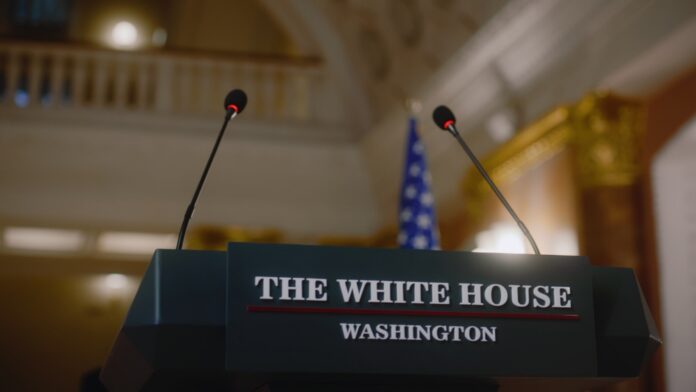 Podium with microphones in a formal government setting