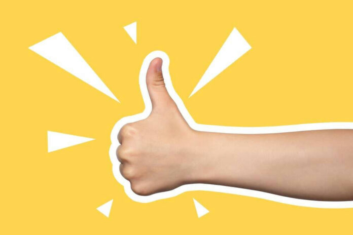 Thumbs up with yellow background.