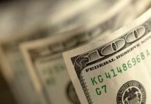 Close-up of a stack of hundred dollar bills