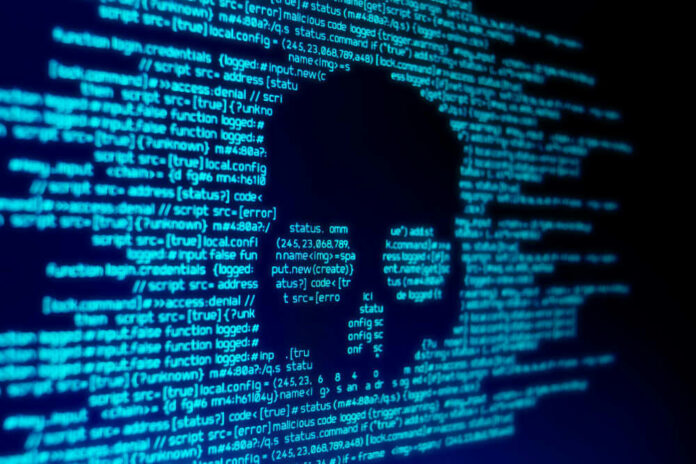 shutterstock_1050436496 Skull silhouette in blue computer code background.