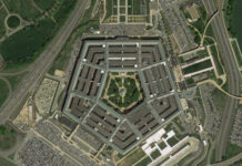 Pentagon Dares America Aerial view of the Pentagon building surrounded by roads and parking lots