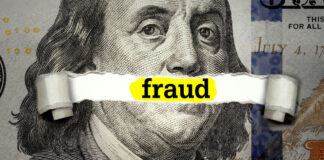 Dollar bill with fraud text overlay
