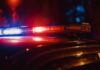 Close-up of a police car's emergency lights at night